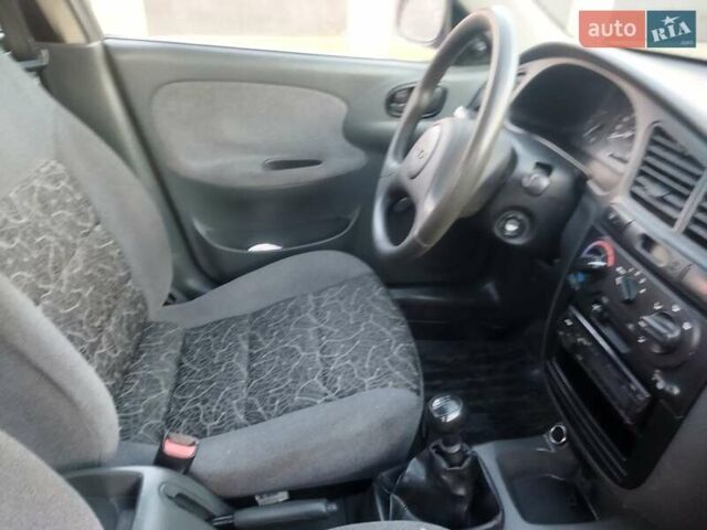 Серый Дэу Ланос, объемом двигателя 1.5 л и пробегом 240 тыс. км за 2650 $, фото 10 на Automoto.ua