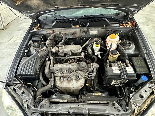 Сірий Деу Ланос, об'ємом двигуна 1.5 л та пробігом 150 тис. км за 1550 $, фото 7 на Automoto.ua