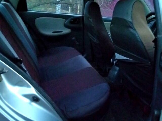 Серый Дэу Ланос, объемом двигателя 1.5 л и пробегом 260 тыс. км за 1530 $, фото 6 на Automoto.ua