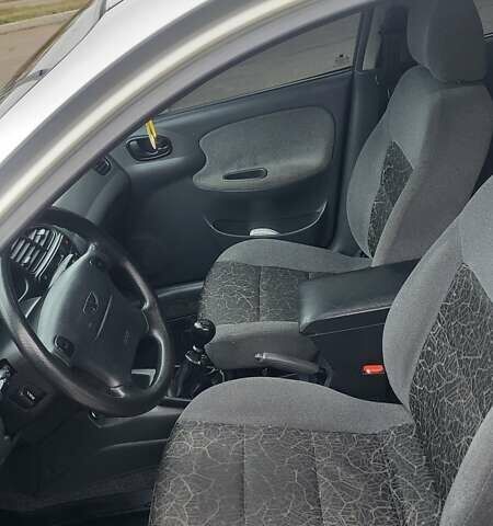 Сірий Деу Ланос, об'ємом двигуна 1.6 л та пробігом 296 тис. км за 3300 $, фото 9 на Automoto.ua