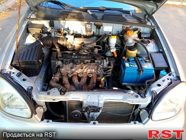 Серый Дэу Ланос, объемом двигателя 1.5 л и пробегом 250 тыс. км за 2900 $, фото 2 на Automoto.ua