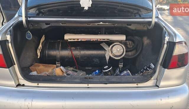 Сірий Деу Ланос, об'ємом двигуна 1.39 л та пробігом 220 тис. км за 3000 $, фото 5 на Automoto.ua