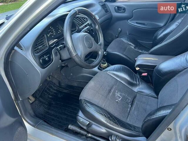 Серый Дэу Ланос, объемом двигателя 1.5 л и пробегом 239 тыс. км за 2650 $, фото 9 на Automoto.ua