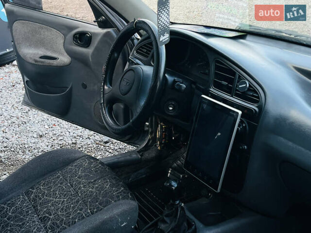 Серый Дэу Ланос, объемом двигателя 1.5 л и пробегом 221 тыс. км за 1850 $, фото 18 на Automoto.ua