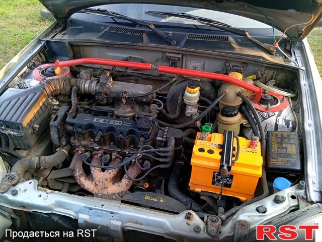 Серый Дэу Ланос, объемом двигателя 1.5 л и пробегом 220 тыс. км за 1000 $, фото 2 на Automoto.ua