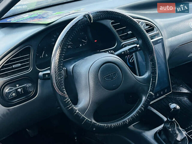 Серый Дэу Ланос, объемом двигателя 1.5 л и пробегом 221 тыс. км за 1850 $, фото 9 на Automoto.ua