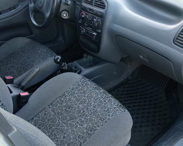 Серый Дэу Ланос, объемом двигателя 1.5 л и пробегом 126 тыс. км за 3000 $, фото 10 на Automoto.ua