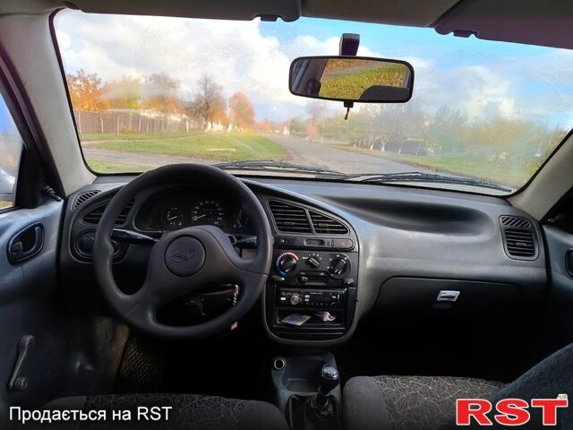 Серый Дэу Ланос, объемом двигателя 1.5 л и пробегом 240 тыс. км за 1799 $, фото 5 на Automoto.ua