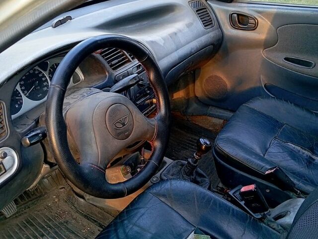 Серый Дэу Ланос, объемом двигателя 1.5 л и пробегом 220 тыс. км за 1000 $, фото 5 на Automoto.ua