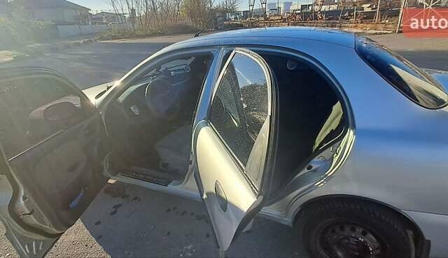 Сірий Деу Ланос, об'ємом двигуна 1.39 л та пробігом 220 тис. км за 3000 $, фото 21 на Automoto.ua