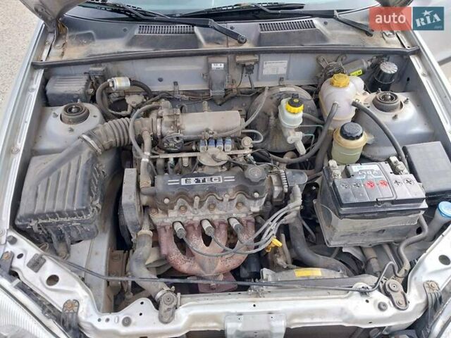 Серый Дэу Ланос, объемом двигателя 1.5 л и пробегом 179 тыс. км за 2000 $, фото 23 на Automoto.ua