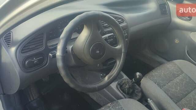 Серый Дэу Ланос, объемом двигателя 1.5 л и пробегом 245 тыс. км за 1750 $, фото 6 на Automoto.ua