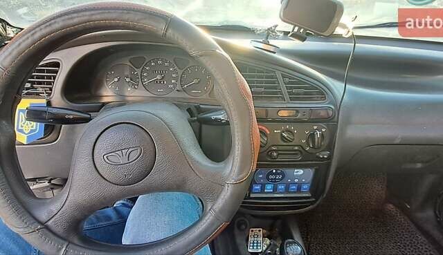 Сірий Деу Ланос, об'ємом двигуна 1.39 л та пробігом 220 тис. км за 3000 $, фото 31 на Automoto.ua