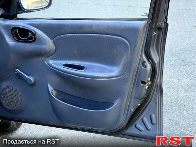 Сірий Деу Ланос, об'ємом двигуна 1.5 л та пробігом 227 тис. км за 1350 $, фото 7 на Automoto.ua