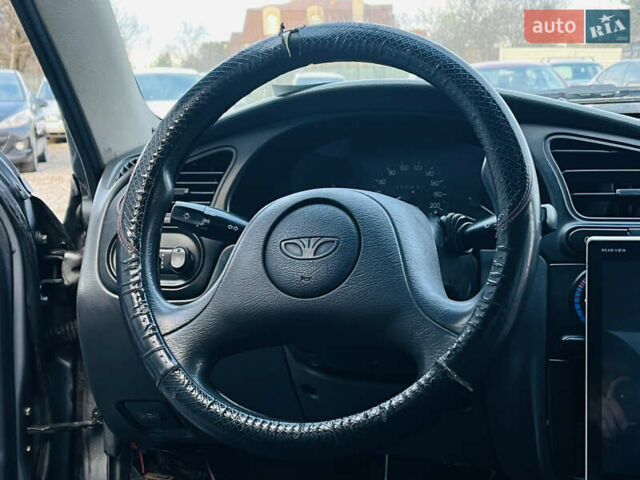 Серый Дэу Ланос, объемом двигателя 1.5 л и пробегом 221 тыс. км за 1850 $, фото 13 на Automoto.ua