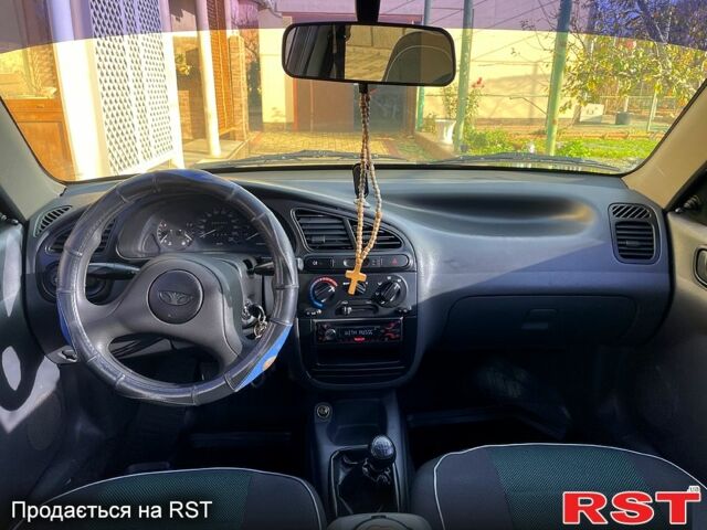 Серый Дэу Ланос, объемом двигателя 1.5 л и пробегом 300 тыс. км за 1900 $, фото 9 на Automoto.ua