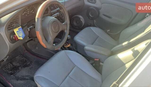 Сірий Деу Ланос, об'ємом двигуна 1.39 л та пробігом 220 тис. км за 3000 $, фото 20 на Automoto.ua