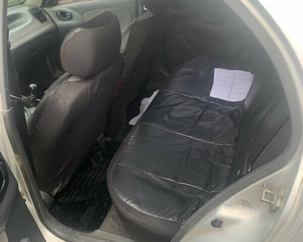 Сірий Деу Ланос, об'ємом двигуна 1.6 л та пробігом 170 тис. км за 1600 $, фото 5 на Automoto.ua