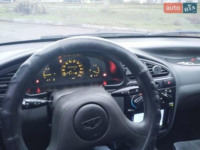 Сірий Деу Ланос, об'ємом двигуна 1.5 л та пробігом 138 тис. км за 2800 $, фото 4 на Automoto.ua