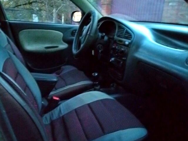 Серый Дэу Ланос, объемом двигателя 1.5 л и пробегом 260 тыс. км за 1530 $, фото 5 на Automoto.ua