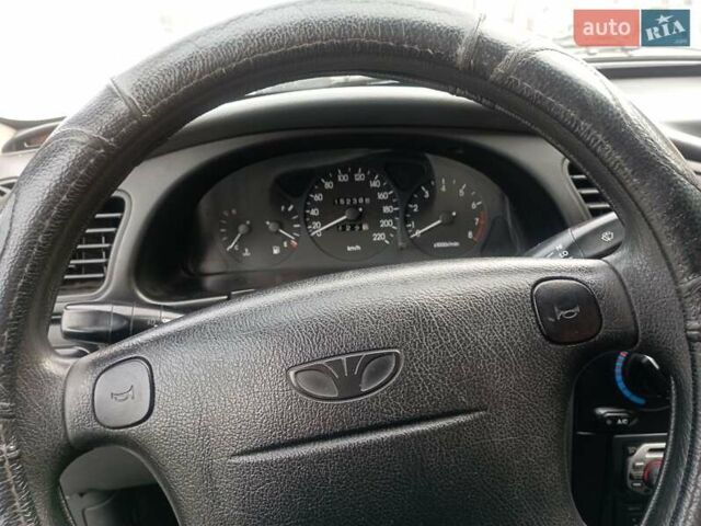 Серый Дэу Ланос, объемом двигателя 1.6 л и пробегом 152 тыс. км за 1750 $, фото 11 на Automoto.ua