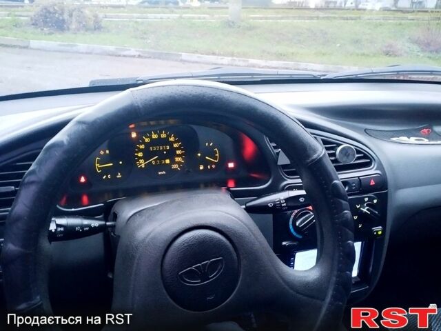 Серый Дэу Ланос, объемом двигателя 1.5 л и пробегом 138 тыс. км за 2800 $, фото 2 на Automoto.ua