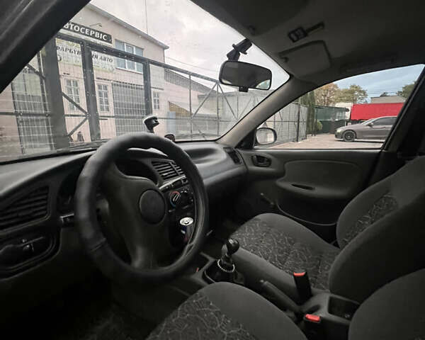 Деу Ланос 2008 у Сарнах на Automoto.ua Сірий Деу Ланос, об'ємом двигуна 1.5 л та пробігом 80 тис. км за 3050 $, фото 7 на Automoto.ua