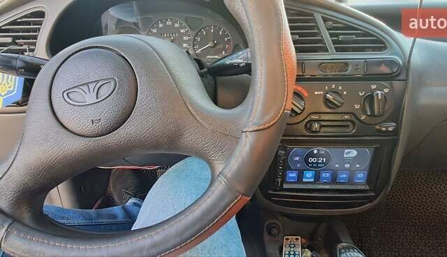 Сірий Деу Ланос, об'ємом двигуна 1.39 л та пробігом 220 тис. км за 3000 $, фото 29 на Automoto.ua