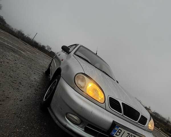 Серый Дэу Ланос, объемом двигателя 1.5 л и пробегом 200 тыс. км за 2000 $, фото 3 на Automoto.ua