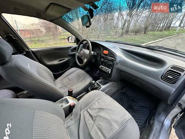 Сірий Деу Ланос, об'ємом двигуна 1.5 л та пробігом 297 тис. км за 1800 $, фото 7 на Automoto.ua