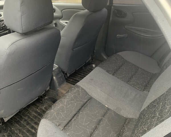 Сірий Деу Ланос, об'ємом двигуна 1.39 л та пробігом 189 тис. км за 1450 $, фото 7 на Automoto.ua