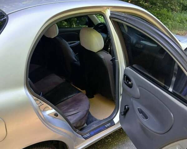 Сірий Деу Ланос, об'ємом двигуна 1.39 л та пробігом 198 тис. км за 2200 $, фото 6 на Automoto.ua