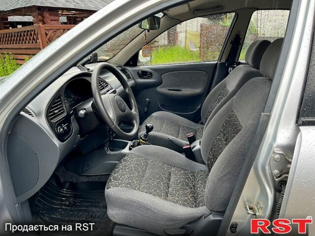 Сірий Деу Ланос, об'ємом двигуна 1.5 л та пробігом 208 тис. км за 2200 $, фото 5 на Automoto.ua