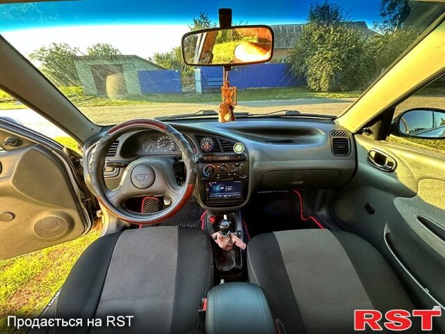 Серый Дэу Ланос, объемом двигателя 1.4 л и пробегом 163 тыс. км за 2700 $, фото 8 на Automoto.ua