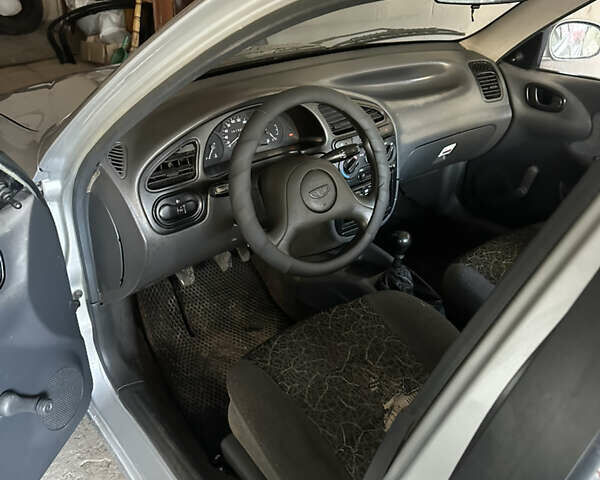 Сірий Деу Ланос, об'ємом двигуна 1.5 л та пробігом 250 тис. км за 1750 $, фото 3 на Automoto.ua