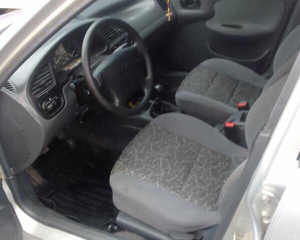 Серый Дэу Ланос, объемом двигателя 1.6 л и пробегом 203 тыс. км за 2900 $, фото 18 на Automoto.ua