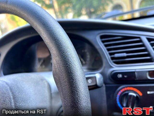 Сірий Деу Ланос, об'ємом двигуна 1.5 л та пробігом 227 тис. км за 1350 $, фото 4 на Automoto.ua