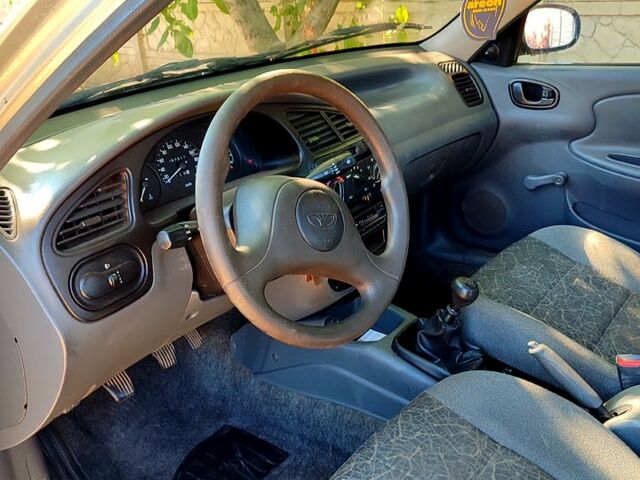 Серый Дэу Ланос, объемом двигателя 1.4 л и пробегом 57 тыс. км за 2200 $, фото 7 на Automoto.ua