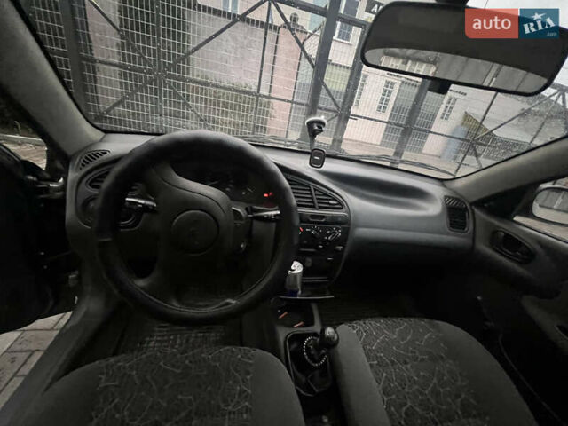 Деу Ланос 2008 у Сарнах на Automoto.ua Сірий Деу Ланос, об'ємом двигуна 1.5 л та пробігом 80 тис. км за 3050 $, фото 6 на Automoto.ua