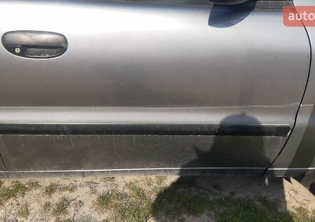 Серый Дэу Ланос, объемом двигателя 1.5 л и пробегом 250 тыс. км за 2200 $, фото 1 на Automoto.ua