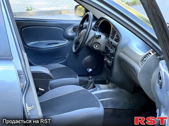 Сірий Деу Ланос, об'ємом двигуна 1.5 л та пробігом 227 тис. км за 1350 $, фото 2 на Automoto.ua