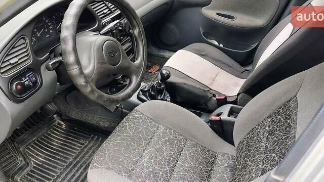 Сірий Деу Ланос, об'ємом двигуна 1.5 л та пробігом 285 тис. км за 1311 $, фото 2 на Automoto.ua
