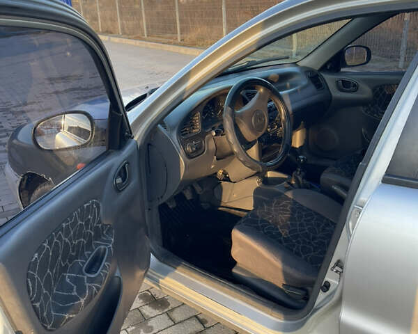 Серый Дэу Ланос, объемом двигателя 1.5 л и пробегом 190 тыс. км за 1550 $, фото 5 на Automoto.ua