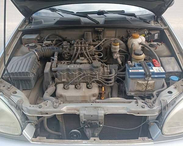 Серый Дэу Ланос, объемом двигателя 1.5 л и пробегом 249 тыс. км за 3100 $, фото 7 на Automoto.ua