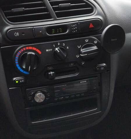 Серый Дэу Ланос, объемом двигателя 1.5 л и пробегом 210 тыс. км за 2000 $, фото 18 на Automoto.ua