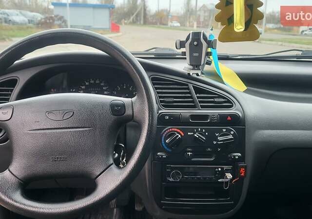 Сірий Деу Ланос, об'ємом двигуна 1.6 л та пробігом 296 тис. км за 3300 $, фото 8 на Automoto.ua