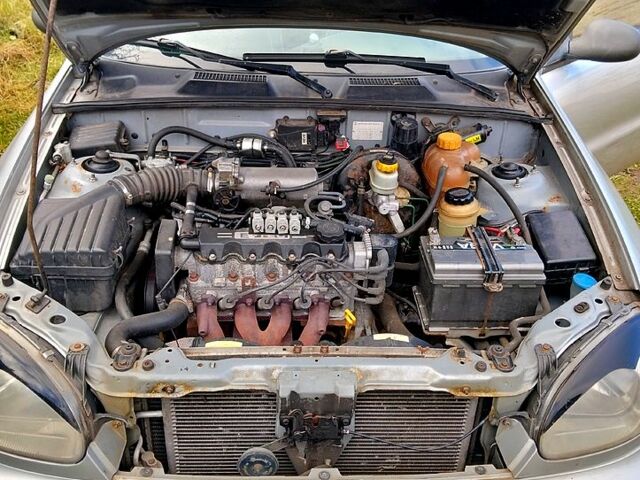 Сірий Деу Ланос, об'ємом двигуна 1.5 л та пробігом 240 тис. км за 1900 $, фото 4 на Automoto.ua