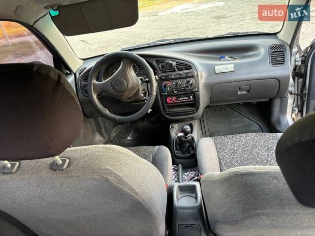 Серый Дэу Ланос, объемом двигателя 1.5 л и пробегом 165 тыс. км за 2650 $, фото 7 на Automoto.ua