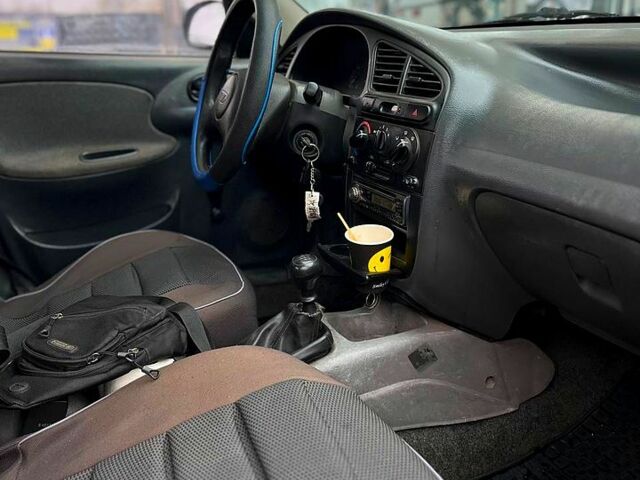 Серый Дэу Ланос, объемом двигателя 1.4 л и пробегом 240 тыс. км за 1550 $, фото 6 на Automoto.ua