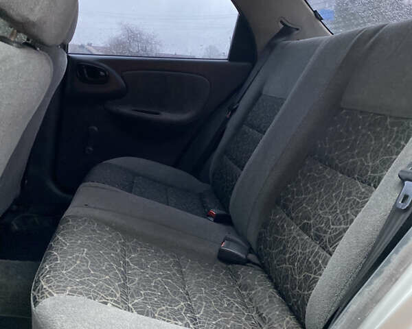 Серый Дэу Ланос, объемом двигателя 1.5 л и пробегом 114 тыс. км за 2550 $, фото 40 на Automoto.ua